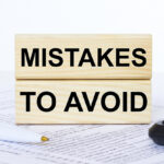 Mistakes To Avoid Text Concept Written On Wooden Cubes Blocks